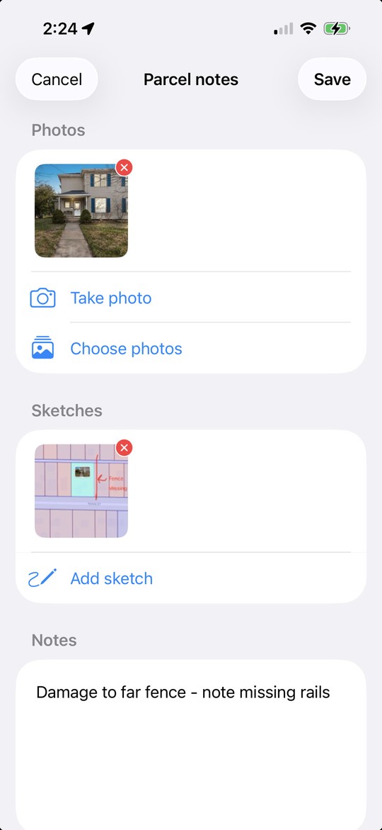 A parcel note containing a house photo, a sketch of a damaged fence, and a written observation